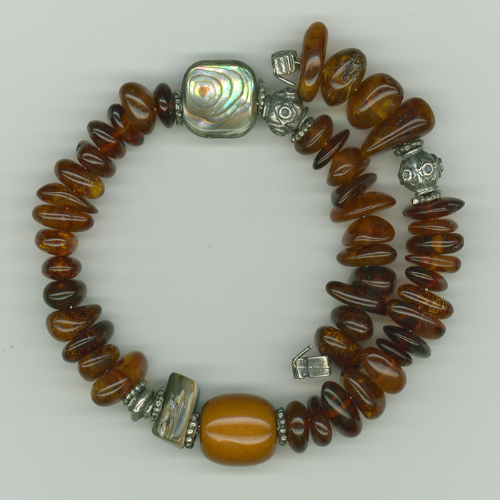 Bracelet made of genuine amber from Baltic sea - cut by hand,mother of pearl (abalone) and silver.