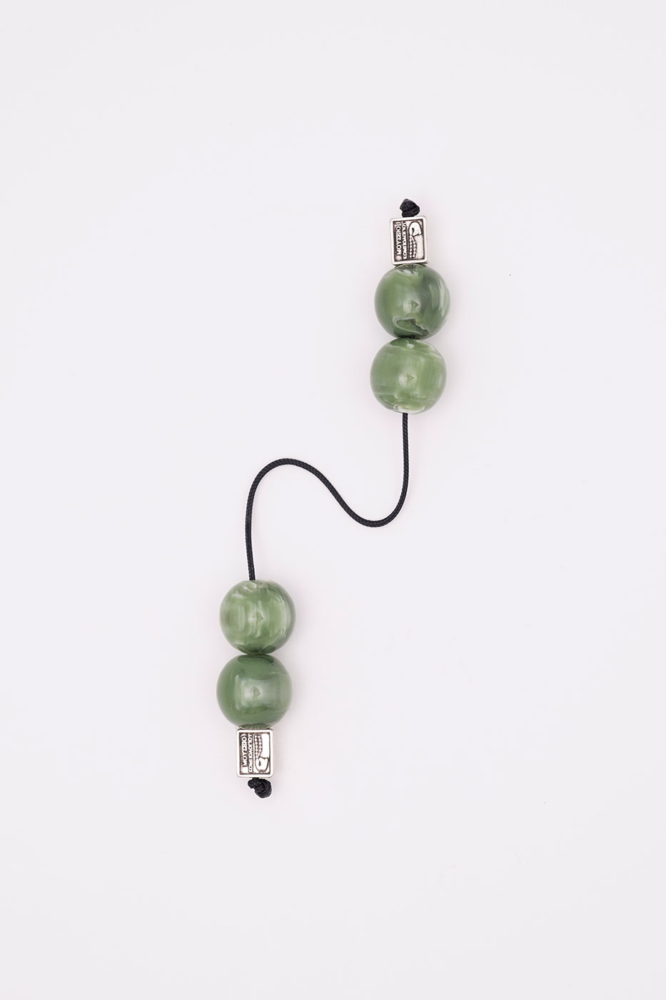 Begleri made of artificial resin (green with water-like shades)