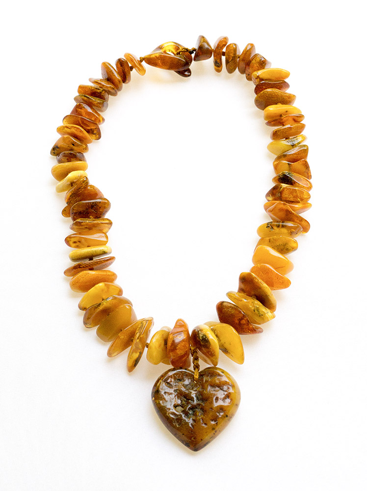 Necklace with beads made of real - genuine amber from Baltic sea - cut by hand.