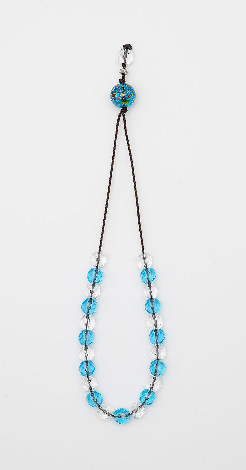 Komboloi-amulet made of crystal -  multi-edged (white-light blue)