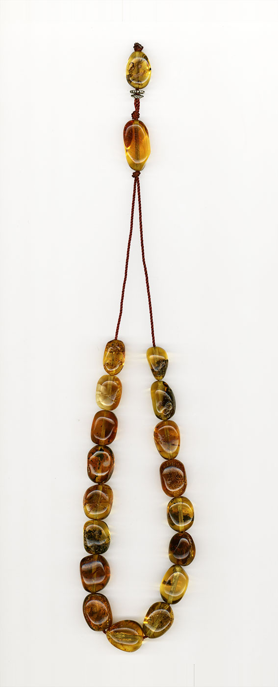 Komboloi made of genuine amber from Baltic sea- cut by hand - Golden brown.