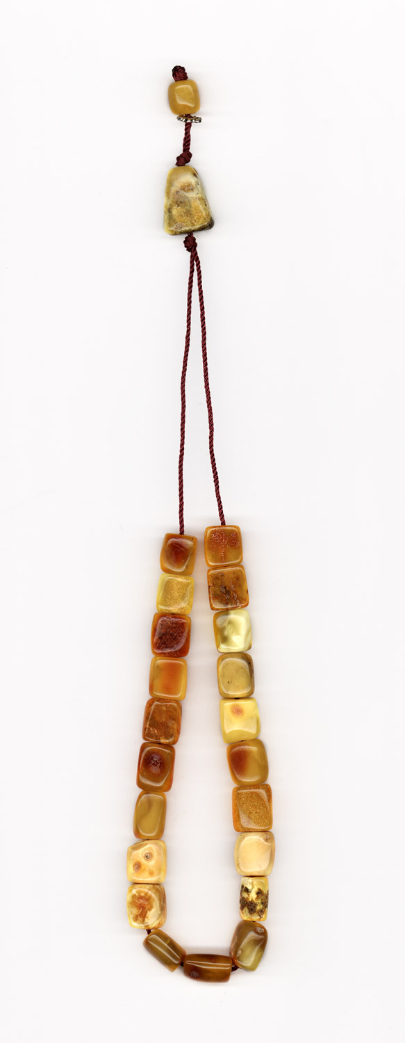 Komboloi made of genuine amber from Baltic sea- cut by hand.