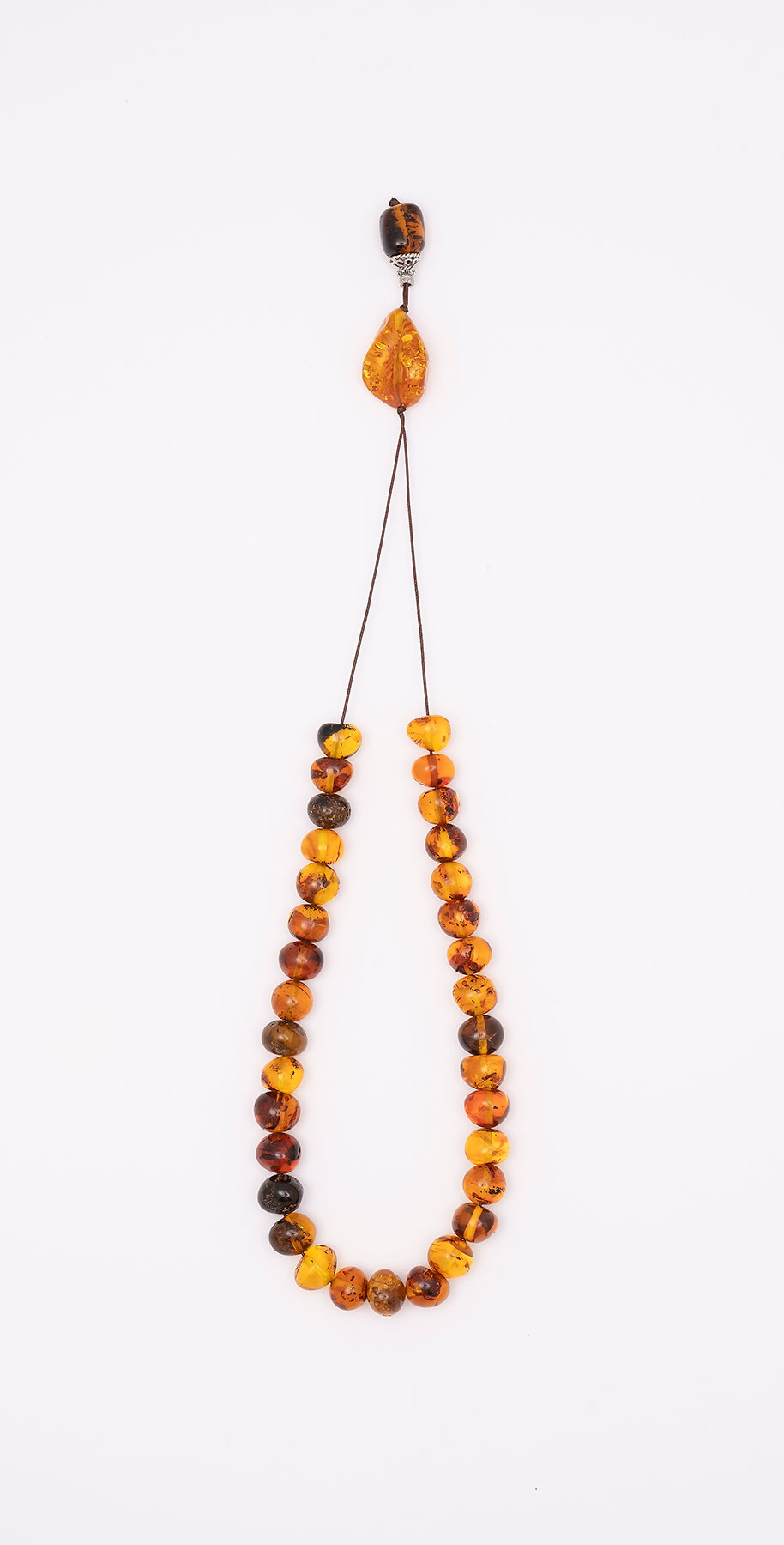 Komboloi made of genuine amber from Baltic sea- cut by hand