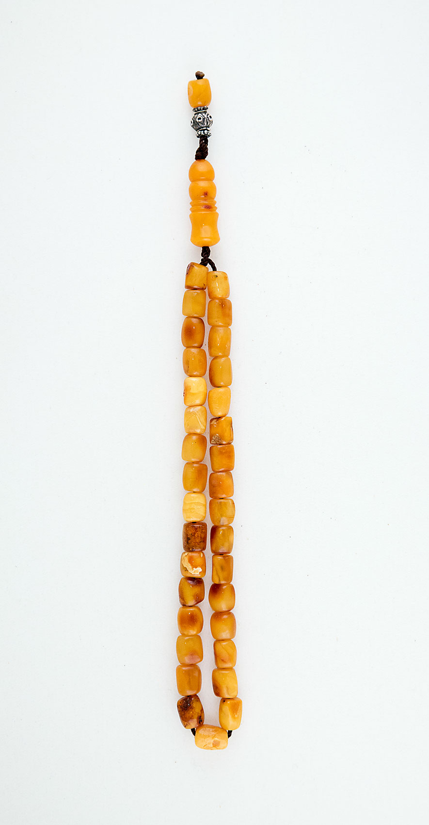 Muslim Prayer beads made of genuine amber from Baltic sea (cut by hand) and tin