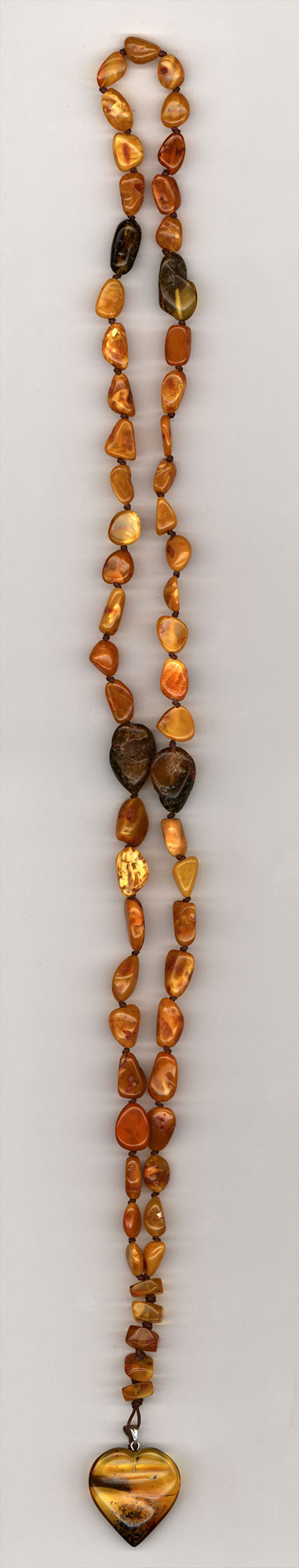 Catholic prayer object -Rosary- made of amber from Baltic sea (cut by hand)