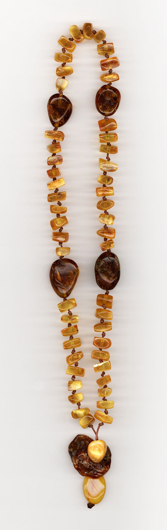 Catholic prayer object-Rosary-made of genuine amber from Baltic sea-cut by hand.