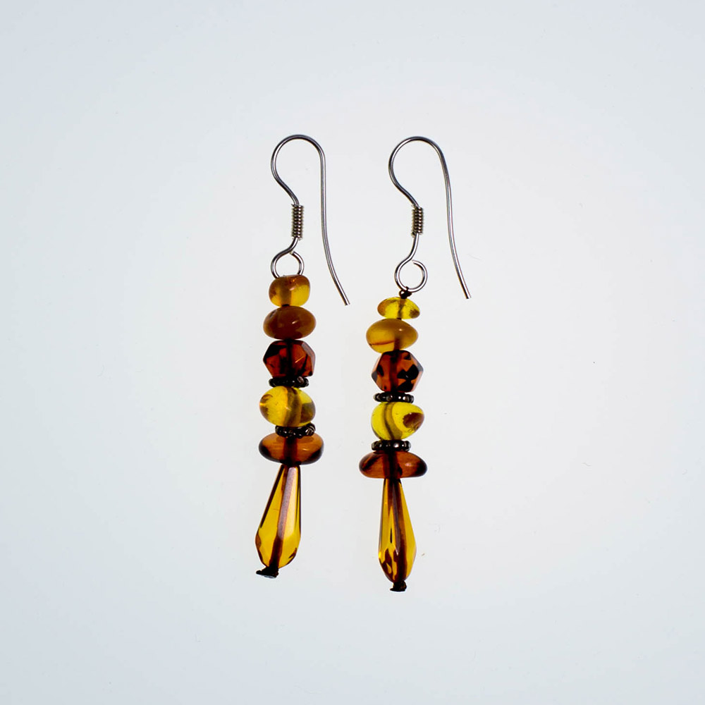 Earrings made of genuine amber from Baltic sea and silver.