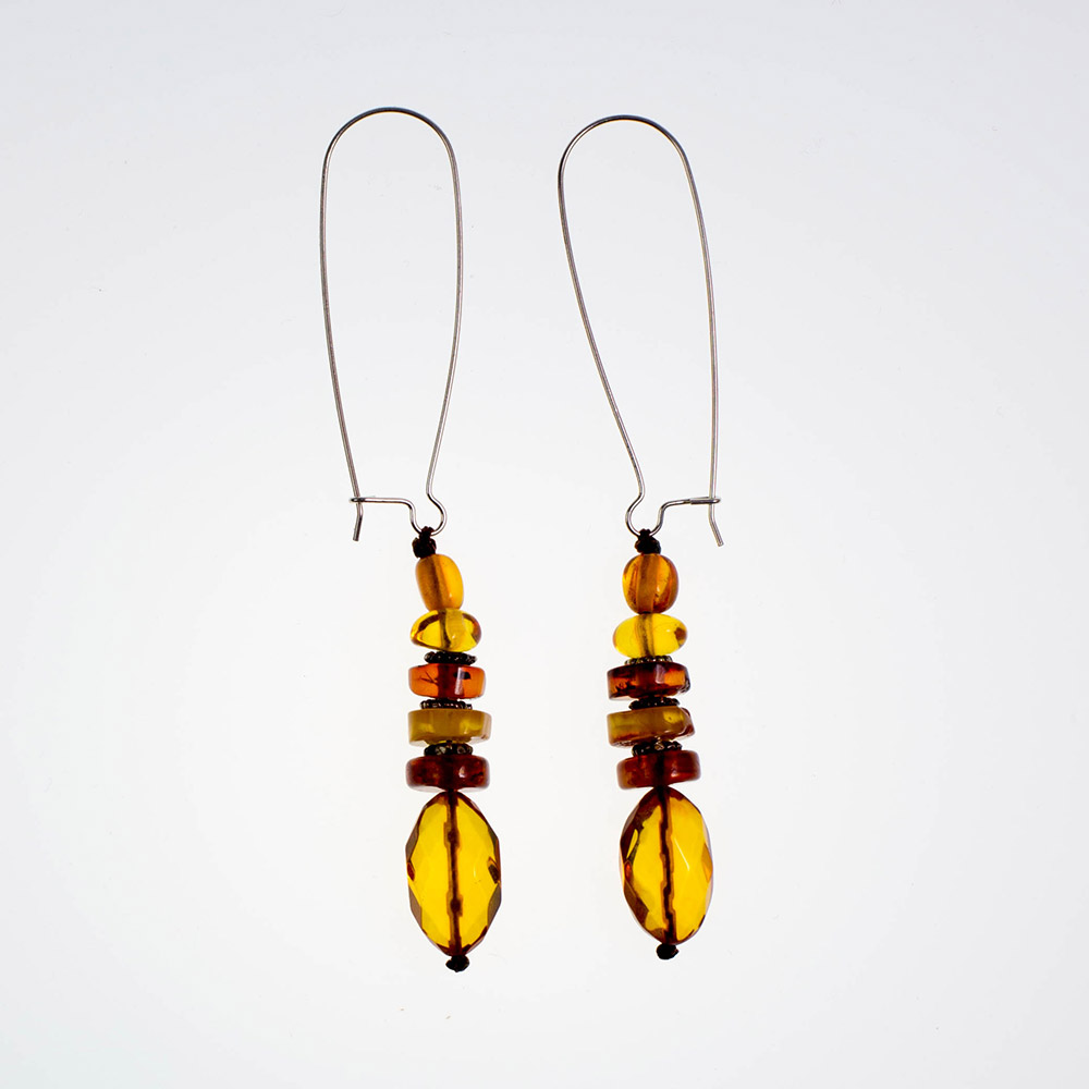 Earrings made of genuine amber from Baltic sea and silver.